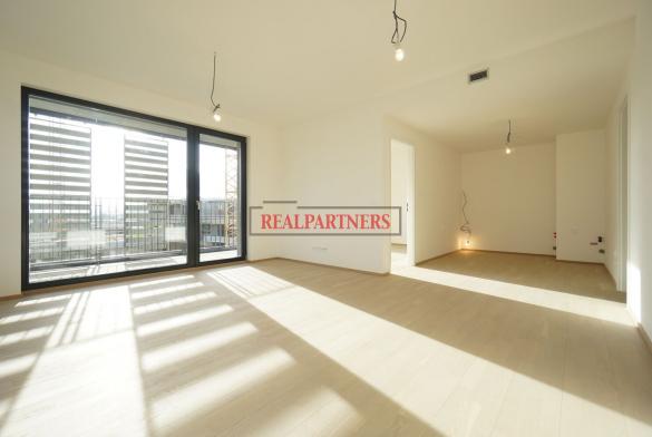 Nový byt 4+kk o ploše 92 m² + 14 m² balkón + 2x koupelna + 2x stání v garážích + sklep.