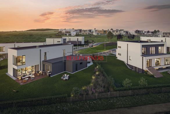 Moderní dvojpodlažní dům, o dispozici 5+kk, o ploše 171 m² a zahradou 492 m² na dosah Prahy 6.